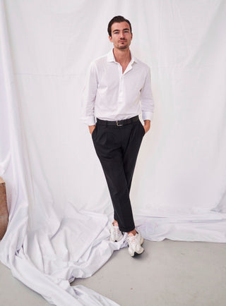 white recycled italian mens popover shirt with black trousers 